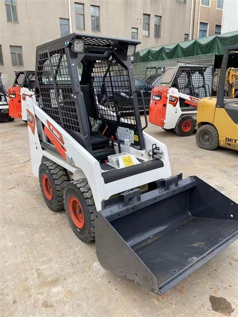 bobcat small skid steer used|smallest bobcat skid steer made.